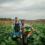 Shot of an attractive young female and male farmers in working c