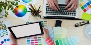 hands-graphic-designers-using-laptop-digital-tablet-scaled-1